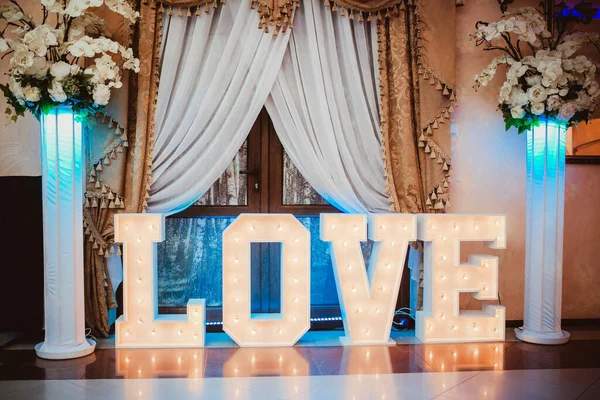 Stunning LED “LOVE” sign displayed at a wedding near Energy Corridor.