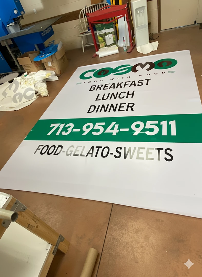 Cosmo Mood banner with Houston commercial signs, listing breakfast, lunch, dinner, and contact info in a workshop setting.