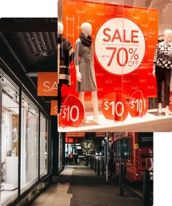 Stylish custom storefront sign designed by a Houston sign manufacturer, displayed outside a modern retail shop at night.