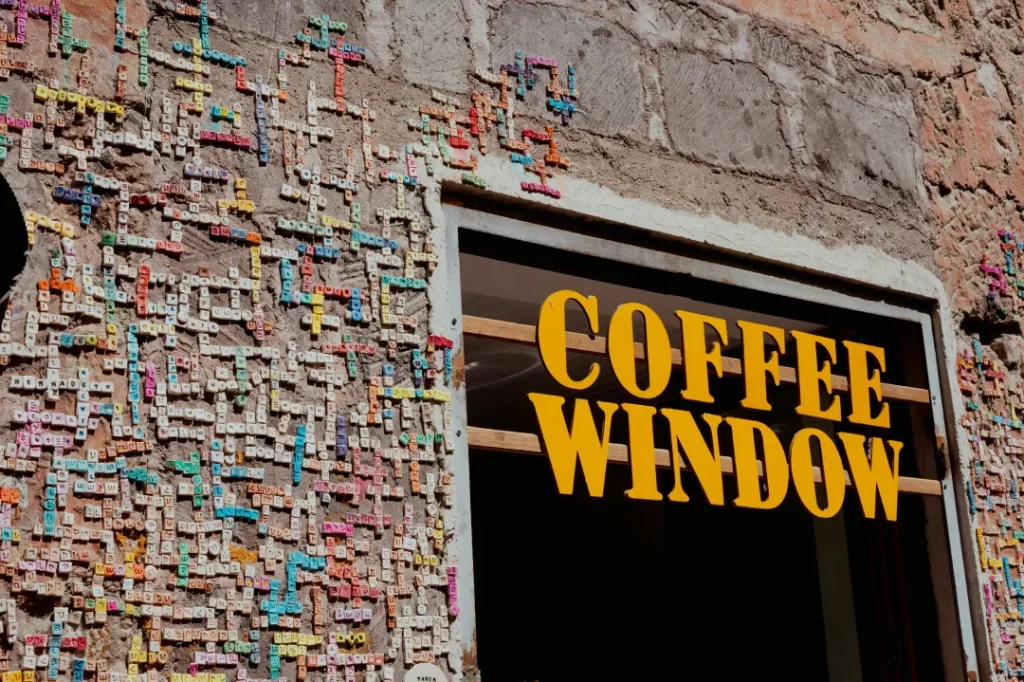 Bold window and exterior mounted lettering designed by Building Signs Houston.
