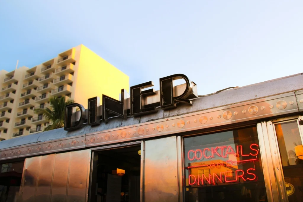 Classic metal and neon lettering crafted by a professional Signage Company Houston.