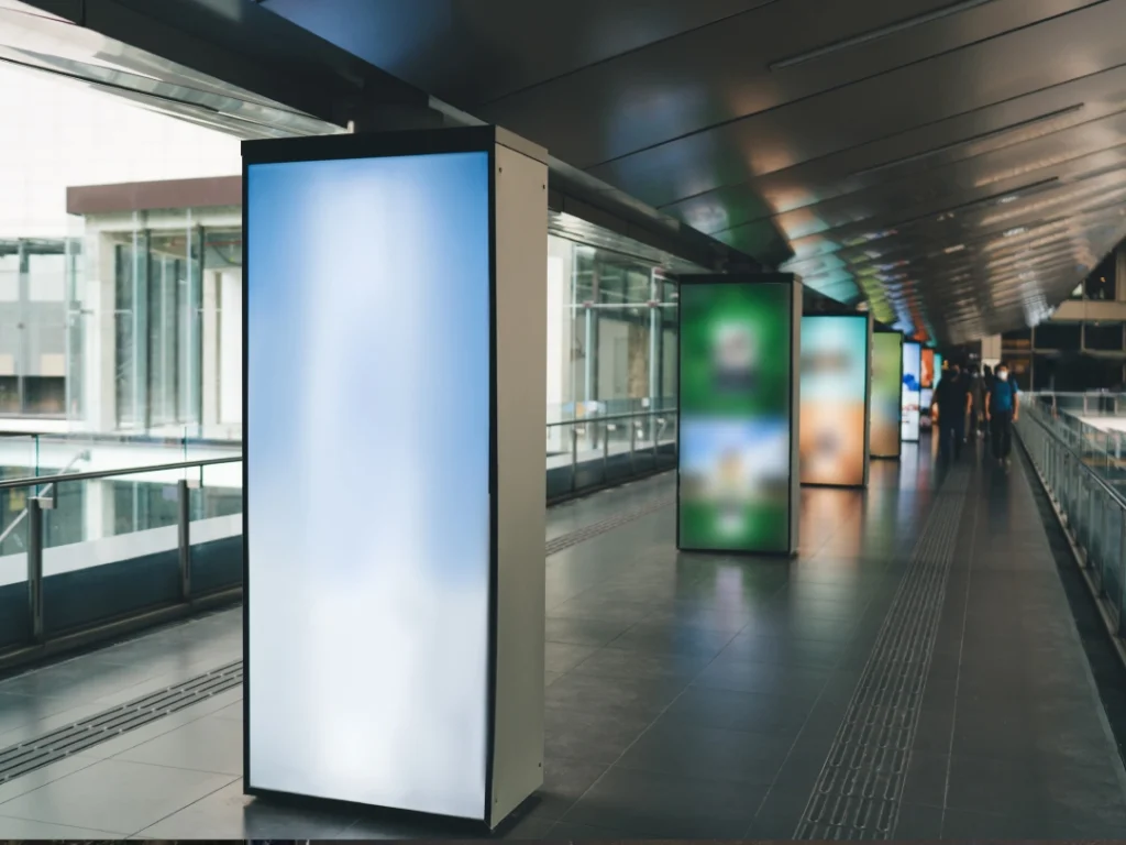 Modern blank digital office signs in a Houston walkway, offered by a top office signs Houston provider for sleek business displays.