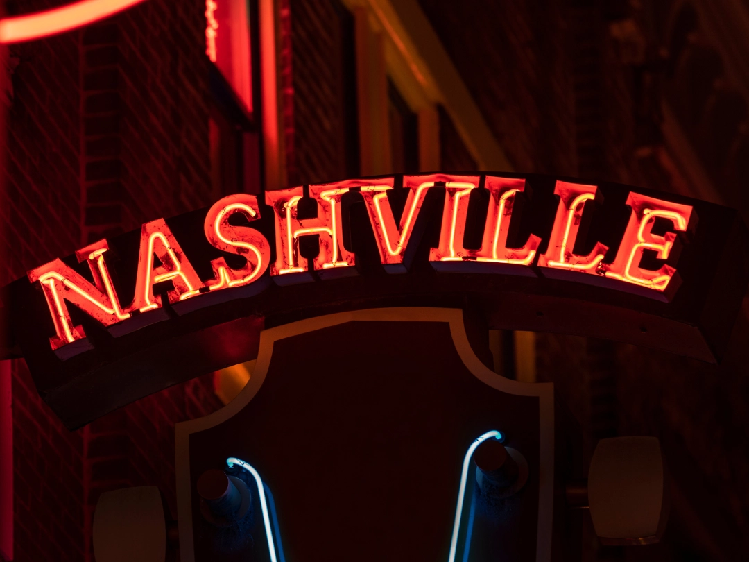 Bright red NASHVILLE sign by a leading business sign manufacturer in Houston, specializing in eye-catching custom signage.