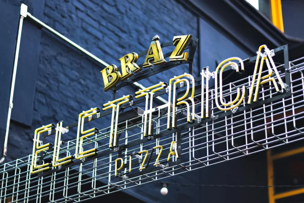 Custom neon and LED signs for businesses expertly installed by Building Signs Houston.