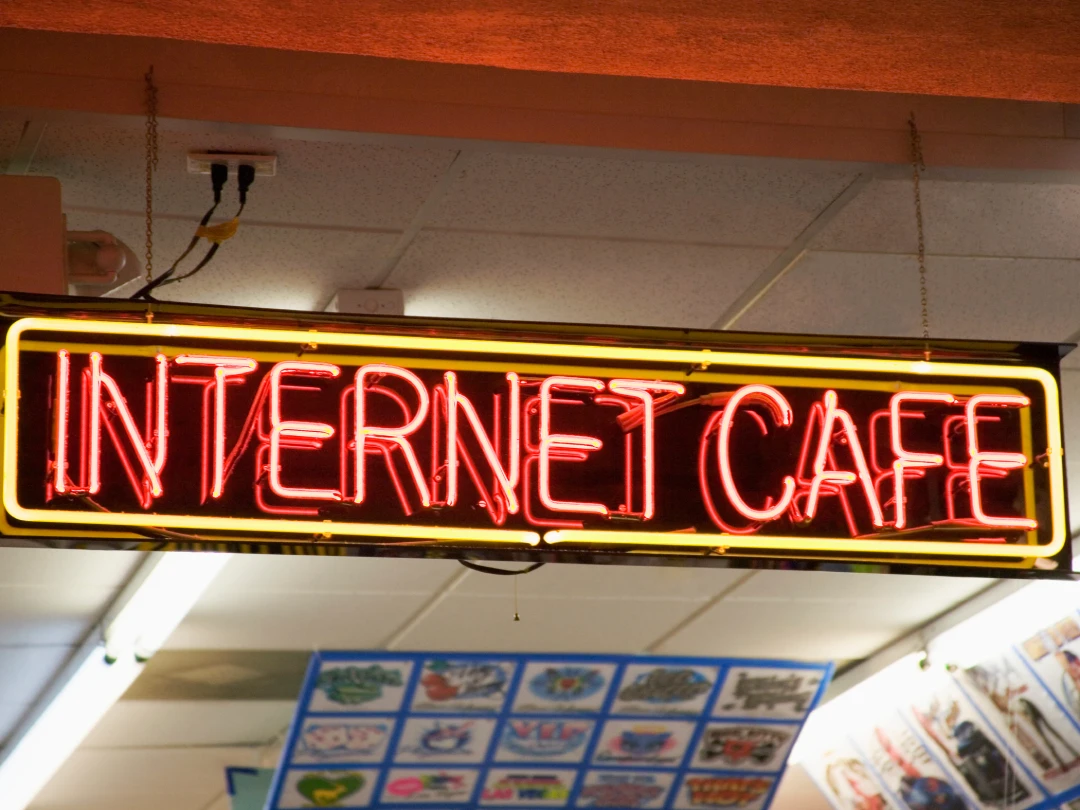 Eye-catching INTERNET CAFE sign by a premier business sign manufacturer in Houston, offering high-quality commercial signage.