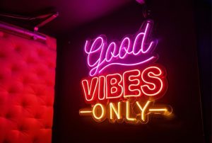 Multi-color "Good Vibes Only" custom LED neon sign with pink and warm white glow – bold custom led neon signs houston for nightlife and retail