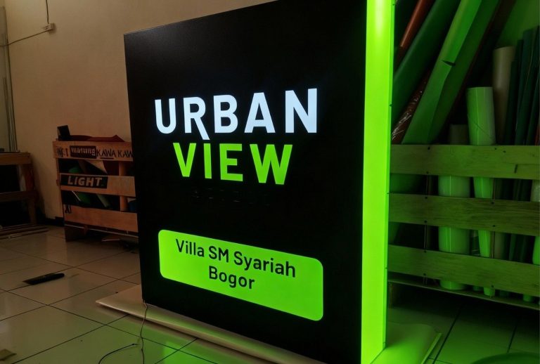 Vibrant green edge-lit acrylic signage for Urban View Villa – precision crafted in our sign manufacturing Houston workshop