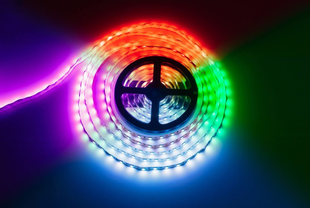 A colorful RGB LED light reel used for high-quality Houston sign installation and vibrant outdoor business signage.