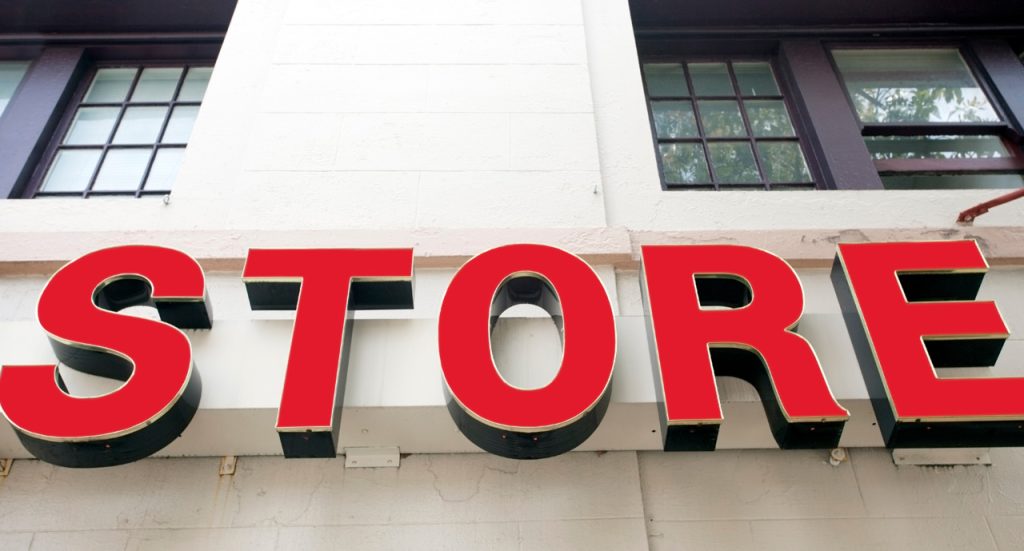 Custom red channel letter storefront display built by a professional sign manufacturing Houston company.