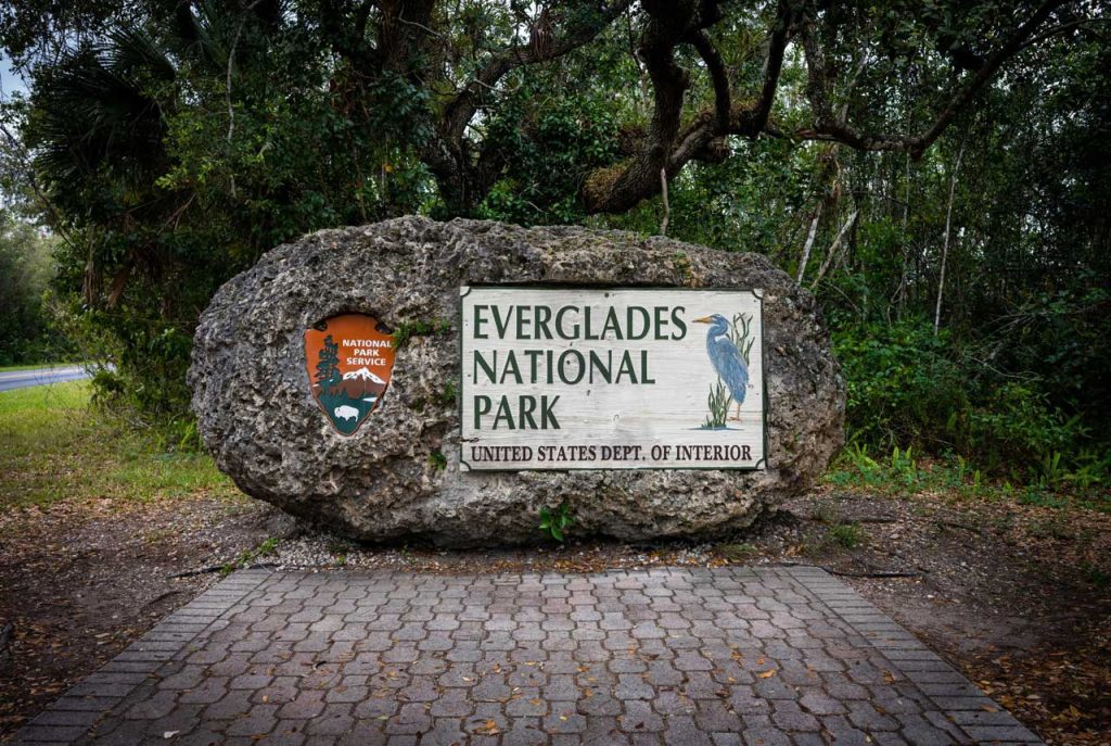 Natural coral rock outdoor signs for businesses Houston mimicking the Everglades National Park entrance monument.