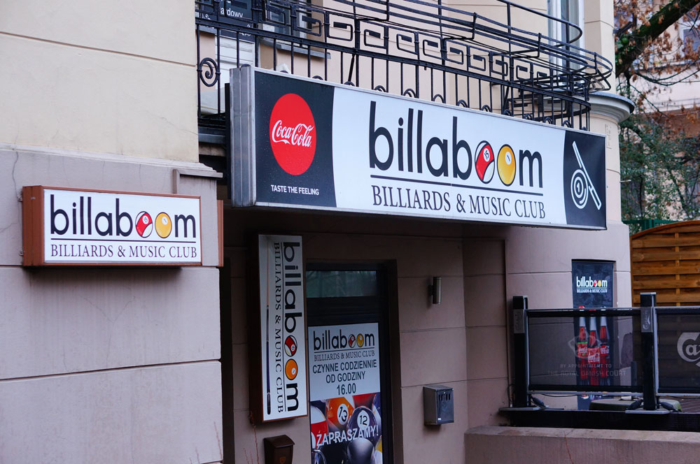 Custom building signs Houston for Billaboom Billiards Club showing a pool hall exterior with logo and Coca-Cola sign.