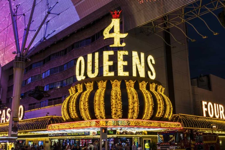 Classic retail signs Houston experts love, showing the bright neon 4 Queens marquee at the Fremont Street Experience.